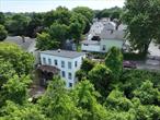Exceptional Two-Family Opportunity in Ossining, NY! This versatile property offers a fantastic chance for first-time buyers or investors to maximize their investment. With one unit freshly vacated, move right in and rent out the second to help cover your mortgage. The home features an attached two-car garage, providing ample parking and storage space. What truly sets this property apart is the buildable lot included in the sale â€“ a rare find with endless possibilities for expansion or development. Conveniently located near schools, shops, and public transportation, this property wonâ€™t last long. Donâ€™t miss out â€“ seize the opportunity to secure your future in Ossining today!