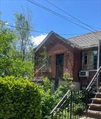 Location Location Location! Jump right on LIE one exit to midtown tunnel, or train/bus short ride into Manhattan. Semi-detached brick duplex, 4 0ver 4. 4 bdrm, 2 bth, garage & driveway. Needs some work. Breathtaking views of Manhattan and bridge. Great investment, great for rental income or large family. Sold as is! An additional rear R4 buildable lot is optional.
