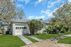 Don&rsquo;t miss this rare opportunity to own this charming ranch-style home in the heart of Long Beach. This coastal charm is ideally situated on an oversized 2.5-lot parcel (approximately 60x100) just blocks from beach access. The partial open concept Brimming with natural light from the oversized Bay window with Western exposure create a warm and inviting home. This beautiful home features -3 spacious bedrooms and 2 full bathrooms which includes a primary bedroom with a private en-suite bath. Enjoy a large sunlit living/dining room, a charming kitchen, hardwood floors, high ceilings, a generous backyard with sliding door access from living/dining room, perfect outdoor living for relaxation and enjoyment after a fun filled day at the beach. This home has central air conditioning, extra room for expansion, a full attic for additional storage and a separate laundry area. A private driveway and a one-car garage provide added convenience.Donâ€™t miss your chance to experience coastal living in this exceptional and inviting home, conveniently close to beaches, the famous boardwalk, popular restaurants, shopping, parkways and public transportation-LIRR!! Experience the best of Long Beach with this exceptional property.