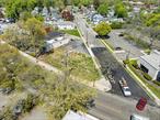 Property consists of 2 areas spot for building and seperate parking lot along side of laundromat for parking located on Main street .