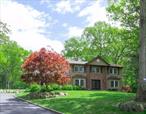 Welcome to nature living at its best! Nestled in a private cul-de-sac, and flanked by the protected forest reserve of the Dix Hills Park, this stunning 5-bedroom, 3.5-bath Center Hall Colonial located in the Half Hollow Hills School District offers a perfect blend of natural beauty, unmatched privacy and modern amenities. Wake up to sunrise and fresh air, as you observe the best of Long Island wildlife in a new professionally landscaped backyard with a stone patio, saltwater heated inground pool, manicured perennials and a lush lawn against the backdrop of the forest.  Upon entering this updated and carefully maintained residence, you are greeted by a spacious entry foyer, setting the tone for a welcoming atmosphere and a seamless floor plan with new hardwood floors throughout. The kitchen boasting modern amenities and a reverse osmosis filtration system, merges with a breakfast nook and is conveniently located adjacent to the family room with sliding doors opening to the back patio. Spacious living room and a formal dining room with butler pantry makes entertaining easy. First floor has a bedroom & laundry room. The second floor of this colonial offers a spacious master bedroom complete with an oversized walk-in closet and primary bathroom with tub & walk in shower. Additionally, there are three other generously sized bedrooms and a full bathroom. The full finished basement with a full bath, presents versatile options for work and play.  Multiple amenities have been updated including new Vinyl siding, windows, internal doors and closet cabinets, a 11-zone sprinkler system, backyard lighting, SS appliances, washer & dryer, energy efficient burner & hot water heater, bathrooms, new oil tank in the basement, air conditioners, and much more. Located conveniently minutes from LIE & Northern State Pkwy, make this your new home!
