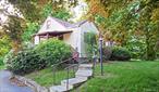 Make your dream home in this peaceable tranquil setting only one hour to New York City. Are you looking for your first starter home or are you ready to downsize? This is the perfect opportunity to customize your home specifically to your taste. While spending your days and nights in this quiet serene setting, you are never far from anything you might need. So come and check out this 2 bedroom, 1 bathroom quaint country Cape featuring hardwood floors throughout, a cozy wood burning fireplace, newer double thermal pane windows, newer boiler and an extra room upstairs. Only 4 minutes to the Brewster MetroNorth commuter rail station.