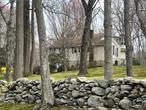 Listing includes 2 adjacent parcels, total 8.6 acres.  House being sold partially furnished.