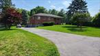 Beautiful home on a quiet dead-end street. Perfect for a home office or growing family. Finish large basement and a legal accessory apartment. Perfect for extended family or for rental income. Huge back deck and beautiful back yard perfect for entertaining. Extra storage in large garage. Oversized driveway. Perfect for multiple vehicles or large toys. Low maintenance brick exterior. Convenient location for easy access to all the Hudson Valley has to offer. This home truly has it all!