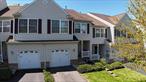 Nestled in the sought-after Holly Ridge subdivision of West Fishkill, this charming three-bedroom, two-and-a-half-bathroom townhouse offers approximately 1, 800 sq. ft. of thoughtfully designed living space, complemented by a substantial unfinished walk-out lower level, perfect for customization into a recreation room, home office, gym, or workshop. Enter to a welcoming main floor optimized for both comfortable living and entertaining. The walk-through kitchen provides ample counter space, cabinetry, and a cozy breakfast nook, ideal for morning coffee. Sliding glass doors lead from the kitchen to a private patio, perfect for al fresco dining or relaxing outdoors. The spacious living room flows seamlessly into an adaptable dining area, suited for gatherings of any size. A convenient powder room and coat closet complete this practical layout. The upper level features an impressive vaulted-ceiling primary suite, boasting a serene office nook, spacious double-door closet, and an additional walk-in closet with custom shelving. The primary bathroom includes an elegant absolute-black granite vanity, soaking tub with shower combination, and ceramic tile flooring. Two additional bedrooms share a well-appointed full hall bathroom. An upper-level laundry closet adds everyday convenience. This meticulously maintained home ensures year-round comfort with natural gas forced-air heating, central air conditioning, town water and sewer, and a newly installed (2023) gas hot-water heater. The home also features a pre-wired alarm system for added security and an attached one-car garage with robust 200-amp electrical service. The bright, full-height basement with daylight windows and sliding glass door provides excellent potential for expansion. Residents of Holly Ridge enjoy a premium lifestyle with a low monthly HOA fee of $233, covering professional lawn care, snow and road maintenance. Exclusive amenities include a clubhouse with a sparkling swimming pool, tennis and basketball courts, a fully equipped fitness area, and a rentable party space for celebrations. Ideally located at 5705 Boulder Way, this townhouse offers unmatched suburban tranquility paired with urban convenience. Minutes from Metro-North stations in Beacon and New Hamburg, commuting to NYC or surrounding areas is effortless. Easy access to I-84 and Route 9 further enhances connectivity. Enjoy proximity to vibrant local shops, restaurants, and cultural attractions in Beacon, Cold Spring, and Wappingers Falls, providing endless entertainment and leisure options. Experience the perfect blend of comfort, convenience, and charm at 5705 Boulder Wayâ€”consistently ranked among Dutchess County&rsquo;s most desirable addresses. Sale contingent upon sellers securing suitable housing. Schedule your private showing today.