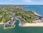Experience the best of North Fork coastal living in this beautifully appointed 3-bedroom, 2.5-bath waterfront condo with breathtaking views of Peconic Bay and Shelter Island. Enjoy your morning coffee as the sun rises or set sail from your dock just steps from your door. With spacious, light-filled interiors, two fireplaces and seamless indoor-outdoor flow, this home is designed for effortless living and entertaining by the sea. A rare offering in a coveted location-just a few minutes from all that Greenport has to offer; boating, shopping, dining, tasting rooms, art and more!