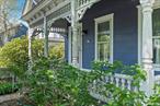 This c.1890 Greenport Village gem boasts 3 bedrooms, 2.5 baths plus a detached studio apartment. Set in the heart of the historic district, it merges many distinctive original details with thoughtful modern updates. A beautifully planted enclosed rear garden with deck and patio, perfect for relaxing and entertaining, leads to a renovated barn which features a 2-car garage and the spacious studio apartment. The main residence&rsquo;s generous ground floor living spaces include a front parlor and living room with original pocket doors, dining room, powder room, and a large renovated kitchen centered on a 48 Capital gas range. Upstairs there are three bedrooms and two full bathrooms, including one en suite. Refinished original wood floors add warmth and character throughout. The restaurants, shops and waterfront of the maritime village are just a few blocks away from this refined and peaceful retreat.