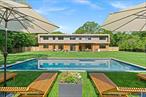Discover the pinnacle of sustainable luxury in this modern, one of a kind home, in the heart of Historic Springs of East Hampton. Designed by Modern NetZero, this home redefines green living in the Hamptons with sleek architecture, warm interiors, and cutting-edge sustainability. A wide open driveway and cleared +/- 1 Acre lot greet you to this 4, 000 sqft above grade, architectural gem of glass, cedar, and stucco. Inside, a dramatic floating steel staircase anchors the open-concept design, where floor-to-ceiling glass doors blur the line between indoors and out. The living room is open and flows seamlessly into the elegant dining area and gourmet kitchen, featuring custom cabinetry, Silestone counters, and top-tier appliances. The breakfast counter, and walk-in pantry complete the space. Outside, a bluestone patio invites you to soak in the expansive back yard, dine al fresco under the rain screen pergola, or lounge by the pool. Upstairs, the luxurious primary suite boasts a spa-like bath, and a walk-in closet. Three additional ensuite bedrooms and a laundry room complete the level. A first floor ensuite bedroom is perfect for guests. The open kitchen looks out the sliding doors that lead to a striking heated gunite pool, and expansive lawn with room for a pool house. Also a secluded family room allows for a quiet space to read or watch TV. Historic Springs offers a charming blend of nature, culture, and convenience, with highlights like the Springs General Store, Ashawagh Hall, and a scenic pond with a walking trail. Its all at your fingertips; residents can enjoy public tennis, basketball, and soccer fields, as well as water and boat access for outdoor adventures. The area&rsquo;s rich artistic history, including Jackson Pollock&rsquo;s house, adds to its unique character, making it a vibrant and inspiring place to live. This is the 15th new home in the Hamptons designed and built by ModernNetZero (www.ModernNetZero .com), the unquestioned leader in green architecture/building in the Hamptons. Designed for true net-zero living, it features geothermal heat, solar energy, and passive solar systems-cutting annual energy costs by $20, 000 and providing $50, 000 in first-year tax credits. In just five years, savings exceed $150, 000. This isn&rsquo;t just a home; it&rsquo;s a revolution in luxury sustainable living.