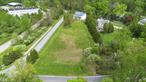 Create Your Dream Home and seize the opportunity to build your perfect home on this stunning 1.86-acre lot. The charming barn, currently used for storage, was once an artist&rsquo;s studio, offering soaring cathedral ceilings, handcrafted beams, and an updated roof. Just 60 minutes from NYC, this property is conveniently located near Metro North, major highways, and shopping centers. Enjoy easy access to local attractions, including the Hardscrabble Tennis & Fitness Club, Brewster Ice Arena, and the Sports Center. Come visit today and imagine the endless possibilities for this unique property.