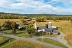 Welcome to Beaver Mountain Farms, a premier Hudson Valley farm property for sale in the heart of Columbia County, NY. Spanning over 41 acres in sought-after Ancram, this rare offering combines charm, functionality, and endless potentialâ€”perfect for those looking to establish a working far, m, agricultural possibilities private equestrian estate, artist retreat, or weekend getaway near Hudson. The beautifully updated 3-bedroom, 2.5-bath farmhouse features a gourmet kitchen, propane fireplaces, a primary suite with ensuite bath, and scenic views of the pool and surrounding countryside. Outbuildings include a classic dairy barn, massive 80x200 structure ideal for an indoor riding arena, workshops, office, and a detached artist studio. With a tranquil pond, partially finished basement, and prime location near Copake, Millerton, Hillsdale, Hudson, and Great Barrington, MA, Beaver Mountain Farms is a turnkey country property with boundless opportunity. Donâ€™t miss this exceptional Columbia County real estate opportunity.