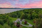 Longmeadow, nestled in the heart of Irvingtonâ€™s prestigious Matthiessen Park, is a true showstopper â€” a timeless example of Hudson River grandeur. Majestically set on 12 sweeping acres of lush, open grounds, this extraordinary estate captures the full splendor of its idyllic surroundings. With commanding views of both the rolling landscape and the tranquil waters of the Hudson, Longmeadow offers a setting that is nothing short of breathtaking.Painstakingly restored and thoughtfully reimagined, the home masterfully blends classic architectural elegance with a sophisticated modern aesthetic. Inside, the interiors exude an effortless sense of luxury â€” cool, comfortable, and undeniably striking. Every detail has been curated to elevate the experience of everyday living, from the soaring ceilings to the perfectly scaled rooms that seamlessly transition from formal to relaxed.Spanning over 11, 000 square feet across four expansive levels, the residence is both grand in scale and intimate in feel. At its heart are eight beautifully appointed en-suite bedrooms, each designed as a private sanctuary, along with twelve bathrooms finished to the highest standard. A dramatic 30-foot interior gallery anchors the home, connecting a series of stunning public rooms that are equally suited for grand entertaining or quiet reflection.A defining highlight of the first floor is the breathtaking loggia, opening to a 100-foot west-facing terrace that frames unobstructed river views. From here, an elegant staircase cascades down to the manicured gardens â€” an exquisite extension of the homeâ€™s architectural beauty.The lower level offers a fully immersive lifestyle experience, with dedicated areas for recreation, fitness, and entertaining. Enjoy expansive playrooms, a state-of-the-art gym, a summer kitchen, and a full bath â€” all leading to the crown jewel: a 21-foot heated indoor pool, offering a resort-quality escape year-round.Just 25 miles from Midtown Manhattan, Longmeadow offers the rare combination of total privacy and immediate access to city life. The charming village of Irvington â€” with its boutique shops, vibrant dining scene, and riverfront parks â€” is just a short stroll away.A once-in-a-lifetime offering, Longmeadow is an estate where timeless beauty meets modern luxury, and every amenity is crafted to deliver an unparalleled lifestyle. With guest quarters, a private dressing area, and garage parking for four or more cars, this is truly a legacy property unlike any other.