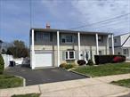 Welcome to 2333 Beech Street! Nestled in South Wantagh, this expanded Cape offers nearly 2, 000 square feet of living space with 5+ bedrooms and is Not in a Flood Zone (AE). Recent updates include brand-new carpeting, freshly painted rooms that are bright and inviting, updated Bath, ductless units for year-round comfort, Laundry Room, Attached Garage and a separate outdoor Utility Room. There&rsquo;s great potential to create a very spacious primary ensuite or potential in-law suite with the proper permits. The backyard is private and manicured - perfect for relaxation and entertaining. This home is zoned for Wantagh School District #23, has Gas in the street and is conveniently located near Shopping, Wantagh Parkway, Seaford Oyster Bay Highway, Wantagh LIRR Train Station, Wantagh Park and Cedar Creek Park which also offers a bike path to Jones Beach! This is a great home that offers both comfort and convenience. Donâ€™t miss out on the opportunity to own this Gem and make it your Home Sweet Home.