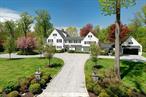 A Rare Opportunity In The Village of Flower Hill Awaits In This Stunning 1926 Classic Colonial Set Back On 1.7 + Acres Of True Park Like Property. This Beautifully Renovated Home Offers Prestige & Privacy In This Ralph Lauren Inspired Country Estate With Charming & Relaxed Entertaining Spaces. Enter Into This Beautiful Residence Into A Welcoming Foyer & Then Step Into A Dramatic Beamed Great Room With Fireplace & Bespoke Built In Bar. A Beautiful Kitchen & Breakfast Room Overlook The Expansive & Exquisite Property. Entertain In Style In The Formal Dining Room or Unwind In The Family Room With Doors Leading Out To A Spacious Patio For AlFresco Dining . The Cozy, Sun Drenched Wood Paneled Den Offers A Place To Unwind . A Gym Which Can Easily Be Converted To A First Floor Bedroom ,  A Mudroom With An Abundance Of Custom Built Ins Plus 1.5 Beautifully Renovated Bathrooms Complete This Stunning First Floor. On The The Second Floor You Have A Birds Eye View Which Overlooks The Great Room, The Primary Suite Offers A Gorgeous Primary Bath & Walk In Closet Space. A Second Primary Suite Option Offers A Sitting Room, Office Space, An Ensuite Bath & Generous Walk In Closet With A Separate Back Stair Case Which Provides Endless Options. Two Additional Bedrooms include One With A Separate Office/Homework Space All Built In & Overlooking The Exceptional Property & Gardens. An Additional Bedroom Is Spacious With A Jack & Jill Stylish Bathroom. The Third Level Consists Of Two Bedrooms & A Full Bath . An Unfinished Lower Level Provides Plenty Of Space For Storage & Utilities . Few Homes Of This Caliber Offer 4700 + Sq Ft Of Architectural Beauty Plus Such Spectacular Grounds To Enjoy For Many Years To Come As Your Own Oasis. Enjoy A Quick 30 Minute Commute To NYC On The Long Island Railroad. An Incredible Opportunity Not To Be Missed .This Property Has The Option Of Manhasset or Port Washington School District.