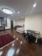 Discover this charming and meticulously maintained studio apartment nestled in a well-kept elevator building at 74-45 Yellowstone Blvd, Unit 2A. Perfectly positioned on the first floor, this home offers a serene living space with easy access and a tranquil atmosphere.Key Features:* Open-Concept Layout: Enjoy a spacious living area that seamlessly flows into a cozy sleeping alcove, maximizing the use of space.* Modern Kitchen: The kitchen boasts white shaker cabinets, quartz countertops, and stainless steel appliances, providing both style and functionality.* Updated Bathroom: Features include polished flooring, white subway tiles, and polished nickel fixtures, offering a clean and contemporary look.* Ample Storage: Two generous closets provide plenty of storage space to keep your living area organized.* Hardwood Floors: Beautiful flooring throughout adds warmth and character to the space.Maintenance of $672/mth includes all utilities. Residence enjoy the convenience of a live-in super and new laundry room. Rego Parkâ€™s vibrant neighborhood boasts Trader Joeâ€™s, top-rated cafes, shopping, and dining, all just moments away. Convenient access to the express buses which makes commuting into Manhattan a breeze.Coop Board Application & Interview RequiredPets: None Allowed