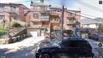 Young brick 3 family building, income producer, walk to F train , buses,  walk in basement with 2 car garage. new roof. building size 22x55
