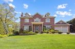 Situated on a beautifully landscaped 0.31-acre lot in the heart of Strathmore Village, this classic red-brick Colonial offers timeless curb appeal and an exceptional lifestyle within the Manhasset School District.Encompassing approximately 4, 000 square feet, this stately residence features 5 spacious bedrooms and 5.5 bathrooms. A dramatic double-height foyer with an elegant spiral staircase sets the tone for the home&rsquo;s refined yet welcoming atmosphere. The fully finished basement adds versatile living space, ideal for a media room, gym, or guest suite.Designed for both functionality and sophistication, the open-concept kitchen flows effortlessly into the formal dining room and inviting family roomâ€”creating a seamless space for entertaining and everyday living. The expansive primary suite serves as a private retreat, thoughtfully positioned for maximum comfort and privacy.Enjoy lush front and rear gardens, ample outdoor space, and a layout that balances grandeur with practicality. Convenient to Schools, Transportation and Easy Access to Major Highways. Close to the Luxury Shopping and Dinning at The Americana Mall.