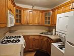 Welcome to this lovely court yard on this quiet block. This upper 2 bedroom features a eat in kitchen with plenty of cabinets washer and dryer hardwood floors, pull down stairs for attic storage with an extra closet in the living room. Maintenance includes gas and electric. Near great schools.