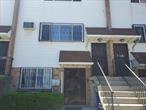 Lovely 2 family unit with a ground floor unit, 3 beds and 2.5 baths and 2nd seperate unit 2 beds and 1 bath with its own entryway upstairs. Gated community with water front views, and park. 2 car parking lot garage available and close to all manner or transportation (bus, train, and ferry), and 15 minutes from airport. Perfect for 2 families like a mother daughter home each with its own privacy or as an additionl income unit. Come make this home yours and add your own special touches. Please excuse the boxes and things around while they are packing to move.