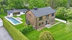 Discover luxury living in this new construction on one of Bellport&rsquo;s prettiest streets located in the heart of the Village. This sunny 4-bedroom home features gracious open concept living spaces, including chef&rsquo;s kitchen with an oversized island and state of the art appliances. The first floor boasts a living room with wood burning fireplace, dining area, mudroom, powder room, office, and den/bedroom with full bath. The second floor includes an ensuite primary bedroom with full bath, make-up area and gas fireplace. There are two additional bedrooms with full bath and laundry room. Wood floors throughout the entire house. Additional structures on this 0.6 acre property include a two-car garage and 500 sf covered porch with fireplace and pool house. Other highlights include a 50 ft long salt water gunite pool, outdoor shower, and deck. Every detail has been crafted for comfort and style.