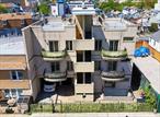 A rare opportunity to own a modern, oversized 3-family brick building in the heart of Sheepshead Bay, originally built in 2005 as condominiums. Spanning approximately 4, 500 square feet, this corner property offers two street exposures, parking for 7 vehicles, and thoughtfully designed layouts unlike anything else on the market.The building consists of two expansive 3-bedroom, 2-bathroom units and a 1-bedroom, 1-bathroom unit on the ground floor â€” all featuring central heating and cooling, large open layouts, and abundant natural light. Each unit enjoys private outdoor space, including a designated roof deck with skyline views, additional private storage in the basement, and multiple private balconies.The finished basement was previously configured as a duplex with the first-floor unit and can easily be reconnected to create a spacious ownerâ€™s duplex or a premium rental. A full-size elevator services all floors, enhancing accessibility and convenience for residents.Each unit is separately metered for gas and electric, and the building is currently tenant-occupied but can be delivered fully vacant at closing â€” ideal for investors, end-users, or condo conversion.This is a unique, income-producing asset with condo-quality construction, unbeatable parking, and luxurious private amenities â€” all in one of Brooklynâ€™s most desirable neighborhoods.