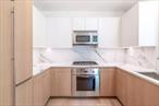 Luxury Living in the Heart of Midtown Manhattan. Spacious 1 Bed, 1 Bath with two walk-in closets, totaling 810 sq ft. Fully renovated with custom Poggenpohl cabinetry, white oak hardwood floors, and fresh paint throughout. Kitchen features premium Sub-Zero, Viking, and Miele appliances. 12-ft ceilings and large windows for bright, airy living. Private balconyâ€”quiet and serene, with city and garden views. In the fall, enjoy the stunning golden foliage of the ginkgo tree just below. In-unit Bosch washer and dryer. Includes private storage. Building Amenities: 24-hour doorman for security and convenience. 24-hour gym and resident lounge. Rooftop terrace with sweeping skyline views. Enjoy the perfect blend of location, luxury, and lifestyleâ€”right in the heart of Manhattan.