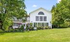 Where History, Nature, and Possibility Converge.Welcome to 262â€“268 Patterson Road, a truly special estate nestled on 5.7 private, park-like acres in West Campâ€”just minutes from the charm of Saugerties and the Hudson River. This 3, 000 sq ft, 4-bedroom, 2-bath home masterfully blends 1940s character with modern updates from 1996 and 2000, preserving its soulful architecture while adding comfort and ease for everyday living.Step inside to find sun-drenched spaces framed by original hardwood floors, hand-crafted details, and a layout that flows effortlessly from cozy corners to open entertaining areas. Every room invites connectionâ€”to each other, to nature, to the rich history embedded in these walls.But the true magic lies beyond the main house.A storybook guest cottage offers endless flexibilityâ€”perfect for extended stays, creative space, or income-producing rental potential. Framed by lush perennial gardens and mature trees, itâ€™s a tranquil retreat all its own.The show-stopping centerpiece of the property is the grand, three-story barn, dating back to the 1890s. With soaring ceilings, exposed beams, and remarkable structural integrity, itâ€™s a blank canvas with endless potentialâ€”think artist studio, event space, equestrian haven, or an architectural statement waiting to be reborn.Outside, the grounds are a symphony of natural beauty: garden beds burst with blooms, stone paths wind through woods, and sweeping lawns invite moments of play, reflection, and stillness. There are views of the Hudson River, space to roam, and inspiration around every turn.Whether youâ€™re sipping coffee as the morning mist rises off the river, hosting unforgettable gatherings under the stars, or saddling up just minutes away at the world-renowned Horse Shows in the Sun (HITS), this is more than a homeâ€”itâ€™s a destination. A legacy. A life well-lived, waiting to unfold.