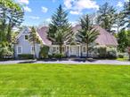 JERICHO SCHOOL AND OLD WESTBURY. This Gorgeous Colonial Is Approached By A Long Circular Drive Offering Beautiful Landscaping.The House Features An Open And Airy Floor Plan Exhibiting Classic Moldings, Gleaming Hardwood Floors, Soaring Ceilings, Central A/C And Spacious Rooms. Total Six Bedrooms With Five Full Bath And One Powder Room, A Gorgeous First Floor Master Suite, Formal Dinning Room, Eat-In Gourmet Kitchen, Custom Cabinetry With Granite Countertop, Access Through The French Doors To The Spectacular Outdoor Entertainment Area Features A New Inground Gunite Pool, Tennis Court, Bluestone Patio And An Inviting And Spacious, Canvas Awning-Covered Veranda. The Second A Bedroom En Suite, 2 Bedrooms With A Shared Bathroom, Guest Bedroom, Full Bath, Oak And Carpeted Floors, And Walk-In Closets. A Basement Ceiling Height Is Over 9 Feet , Full Basement Provides Additional Storage Space Plus Recreation Area. Convenient To Major Highways And Railway.