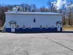 HIGH TRAFFIC LOCATION! GREAT EXPOSURE! 3600sqft with additional 500 Upstairs! Heating Garage with 18 Foot Ceiling and 3 Large Over Head Doors! Two Separate Offices! Kitchen! Two Bathrooms and Half Bathroom Upstairs! Paved Parking Lot that has 18 Spaces! Close to Major Highways for Easy on and off Access! Building is in Great Condition!