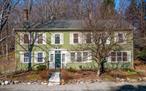 For those seeking the ultimate in charm and comfort, The Preston House, one of the accommodations at the renowned Old Drovers Inn Bed and Breakfast, is now available for sale. This beautifully renovated 3, 088 SF colonial blends old-world elegance with modern conveniences, offering a truly unique living experience. Steeped in history, the home features period architectural details throughout, including wide plank flooring, intricate trim and moldings, staircases, and exquisite wood fireplace mantels. The first floor boasts a spacious living room, formal dining room, country kitchen, half bath, sunporch with brick flooring with access to a private back patio. A cozy library, complete with a back staircase that leads to a private bedroom and full bath on the second floor. The highlight of the first floor is the primary suite, a charming retreat with a vaulted and beamed ceiling, a fireplace, an en-suite bath, and direct patio access. The center hall staircase leads to two additional bedrooms, both with full bath attached, several hall closets, one with the washer and dryer. Outdoors, the home features a back patio, an expansive lawn, and a detached two-car garage. The home could be sold fully, semi or unfurnished, as well as stocked with all the essentials for the kitchen, bedrooms, and bathrooms. Whether youâ€™re seeking a year-round retreat, weekend getaway, Airbnb or investment opportunity, The Preston House is a must see. Ideally situated just down the block from Old Drovers Inn B&B and Tap Room Restaurant, The Preston House is surrounded by the charming Harlem Valley villages of Pawling, Millbrook, and Amenia, as well as the nearby Connecticut towns of Sharon, Kent, Gaylordsville, and Sherman. Commuters will appreciate easy access to Route 22 and the Wingdale Metro-North station, which offers a direct route to New York City in under 1 hour and 45 minutes. Offering a perfect blend of history, elegance, and convenience, this remarkable home is ready to welcome its next owner.