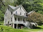 Off a quiet country road and down a long driveway sits an original Mileses homestead, reminiscent of years gone by. Dating back to circa 1850, and added to and improved over the years, this home features a rocking chair front porch where you can relax and take in the sounds of nature and enjoy the distant views. This vintage farmhouse offers good-sized rooms and some original features, with great potential for the buyer who appreciates old homes. Privately set on 6.64 acres, the land is beautifully timbered and mostly level to gently sloping. There is a spring on the property that is the water source for the home, plus remnants from a barn and old blacksmith shop can also be found. Don&rsquo;t miss the opportunity to visit this property if you&rsquo;re looking for that special place in the country where your creativity can soar.
