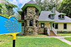 Step into history with this truly distinctive propertyâ€”The Bel Air Lodge. Originally constructed in 1898, this remarkable home served as the Gatehouse/Lodge to the grand Bel Air Mansion in the heart of Glen Spey, NY. Thought to be designed by world-renowned architect Henry Janeway Hardenberghâ€”famed for iconic NYC landmarks such as The Dakota, The Plaza, and the Waldorf Astoriaâ€”this property is steeped in architectural heritage and elegance. Formerly part of the ornate estates developed by the Singer, McKenzie, and Proctor families, this historic residence has been masterfully renovated down to the studs with premium appointments throughout. The home features soaring 9-foot ceilings, large thermal windows, and an impressive grand entryway with an open staircase leading to the second floor and a covered outdoor lodging deck. The expansive formal living and dining rooms are anchored by original stone tower walls, providing historic charm blended with modern luxury. Art enthusiasts will appreciate the abundance of wall space, perfect for displaying collections. The cathedral-ceiling kitchen is a chefâ€™s dream with generous counter space, custom hardwood cabinetry, quartz countertops, and high-end LG Wi-Fi-enabled, fingerprint-resistant stainless steel appliances. Additional features include under-cabinet lighting, a ceramic backsplash, and porcelain heated flooring.On the first floor, youâ€™ll find a cozy den, utility room equipped with a large-capacity LG washer and dryer, a massive dining and living room with an electric fireplace, and a full bathroom featuring a glass-enclosed rain shower, heated porcelain flooring, and illuminated anti-fog vanity mirrors. Upstairs, the primary bathroom showcases a stunning original footed cast iron bathtub, a hand-painted Vitus Austrian porcelain sink, and charming open stone walls. The master bedroom includes a spacious walk-in closet, and charming window seating area, while the second bedroom features dramatic cathedral/pyramid walls. A unique upstairs great room with dormer ceilings and an electric fireplace creates an inviting lounge or flex space. Natural wood ceilings are crafted using the artisanal shou sugi ban burn technique. The home is insulated with a combination of closed/open-cell spray foam and sound-deadening interior wall insulation. Flooring throughout is made of durable 3/4 Blue Ridge yellow pine. LED lighting with adjustable dimmers and color settings add ambiance to every room.  A Timberline HDZ shingle roof, high-end half-round 6 gutters, and Simonton BrickMould 600 windows ensure durability and efficiency. Climate control is handled by three Senville super-efficient Wi-Fi mini-split compressors powering seven individually adjustable indoor units, supplemented by additional Wi-Fi-enabled electric hydronic baseboard heating. The large walk-down basement offers potential for a studio or workshop. A Rheem Wi-Fi-enabled heat pump water heater, all-new plumbing and electrical systems with GFI breakers, and a whole-house surge protector ensure top-tier safety and performance. The gracious front porch is framed by mature white pine and hemlock trees and beautiful pinky winky hydrangea trees. The generous driveway accommodates 6+ vehicles, and ample storage is available in the attic, basement, and under the stairs. Situated with convenient access to Bethel Woods, Resorts World, Forestburgh Playhouse, Kadampa Meditation Center, Barryville Farmers Market, Ski Big Bear, The Eldred Preserve, restaurants, the Delaware River, and a variety of outdoor activities, this home offers an unrivaled lifestyle. With its unique roof valleys, dramatic pitches, intricate dormers, and iconic stone tower, The Bel Air Lodge stands as a rare architectural gemâ€”an extraordinary blend of history, artistry, and modern luxury.
