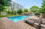 **Renovated Ranch Home with in ground pool in East Marion**Welcome to 4200 Rocky Point Rd, a delightful home nestled in the serene setting of East Marion, NY on a square flat lot of approximately 1/2 acre, featuring an in ground pool. This beautifully maintained residence offers a harmonious blend of comfort and modern elegance, perfect for those seeking a peaceful retreat.This home features three spacious bedrooms and two fully renovated bathrooms and a cozy living area centered around a charming fireplace providing ample space for relaxation and privacy. The thoughtful renovations extend throughout the kitchen and baths that enhance the home&rsquo;s overall appeal.Situated on a desirable corner lot, this property offers a sense of openness and privacy, with lush surroundings that create a tranquil outdoor oasis only .03 of mile to a beautiful sound beach at the end of Rocky Point Road. Additionally enjoy the use of Trumans private Beach only available to East Marion and Orient residents exclusively, and Islands End Golf course and country club located only 1.4 miles from this home.Whether you&rsquo;re looking to entertain guests or unwind in solitude, 4200 Rocky Point Rd provides the perfect backdrop for a life well-lived. Schedule your viewing today and step into the tranquil lifestyle you&rsquo;ve been dreaming of.