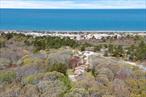 Includes TWO lots totaling one residential waterfront lot with a preexisting two story house on 7 acres. The other is an additional vacant buildable lot available with nearly 2 acres. With 250 feet of private sandy beach, you&rsquo;ll have endless opportunities. Explore a rich natural landscape with a dedicated nature trail, home to wild blueberries, cranberries, and beach plums, plus an osprey platform. The existing structure provides an exceptional site to build the custom home you&rsquo;ve always envisioned.
