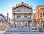 This exceptional all-brick multi-level residence sits on a 40x100 lot with a 25x60 building footprint, showcasing quality construction and thoughtful design throughout. Built with high-end materials rarely found at this price point, the property offers a spacious and versatile layout ideal for a variety of living and working needs. The first level includes a 3-bedroom, 2-bathroom unit featuring modern finishes and generous living space. The second and third levels each include two 2-bedroom, 1-bathroom units with private terraces, offering comfort and privacy. The lower level adds further flexibility with two professional office spaces, a utility room, and two additional units. Each unit is equipped with its own thermostat and legal egress, ensuring safety and individual control. This well-maintained building presents a unique opportunity for those seeking space, functionality, and long-term value in a prime location.