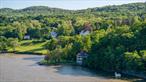 A Rare Hudson Riverfront Opportunity - Historic Stone Home with Unmatched Views and Endless Potential It&rsquo;s not often a property like this becomes availableâ€”a one-of-a-kind 1870s stone ferry house, set on 3.3 private acres right at the edge of the Hudson River. With sweeping, unobstructed views and a direct connection to the water, this is a chance to create something truly extraordinary.Step onto the property and feel transportedâ€”a peaceful, almost spiritual escape where nature takes center stage. The adjacent private beach frontage offers the potential for a boat launch or dock, making this a dream for river enthusiasts or anyone craving a direct link to the water. The home itself is a blend of old-world charm and ready-to-be-finished possibilities. Original period details like exposed wood beams, stone walls, and gothic windows create a rich historic backdrop, while the modern open floor plan offers the perfect canvas for your vision. Spanning three floors and over 2, 900 square feet, the layout is both spacious and inspiring. Recent upgrades include a full metal roof, setting the stage for the rest of the renovation. The dramatic floor-to-ceiling windows on the river-facing side invite light and views that make you feel immersed in the natural surroundings.This is an ideal opportunity for a buyer who wants to guide the final chapterâ€”choose the finishes, details, and features that bring your dream Hudson Valley home to life. The large lot offers plenty of room to expand, whether it&rsquo;s a pool, guest cottage, or studio. Just 80 miles from NYC, this property is a retreat, a project, and a rare piece of historyâ€”ready for you to make it your own.