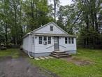 Bungalow at the end of a quiet street, 2 bedrooms and 1 bathroom, 900 sq ft with attic finished for storage. Interior condition is move in ready. Level lawn, listen to the soft hush of the flowing water in the ravine below. Not in a flood zone. Cash or conventional only.