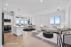 Experience elevated waterfront living in this exquisite 3 bedroom, 3 bathroom corner unit at The Accolade. This newly renovated condo offers 2, 130 sq ft of spacious elegance, breathtaking views of the Manhattan skyline and complete maintenance free living adding serenity to your daily life. The thoughtfully designed floor plan includes a primary suite adjacent to the main living area, while the second and third bedrooms are situated away from the central living space. This configuration offers privacy and flexibility, making it ideal for an in-law suite or guest quarters. In addition to the living and dining area, a separate den offers the ideal space for a home office or reading nook. Storage is abundant here. Step out onto the dual-access terrace for panoramic views of the stunning skyline, the perfect backdrop for unwinding or entertaining. This full-service building offers everything you need for maintenance free living: 24-hour guard-gated security, full-time doorman, live-in superintendent, designated parking with EV charging, and a host of amenities including a gym, tennis courts, resident lounge, childrenâ€™s playroom, picnic areas with BBQ grills, and a dog run. Located just a short walk through private gate access from both the Staten Island Ferry and the fast ferry to Midtown. St. George is in the midst of an huge exciting transformation, with major developments like the eco-friendly housing development and the expansive 38 acre New Stapleton Waterfront, bringing new energy and long-term investment value to the area. With its prime location, sweeping views, and full suite of amenities, this turnkey condo is not only a stunning place to live, itâ€™s a rare opportunity to invest in whatâ€™s next.