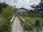 This Home is Available To Rent Weekly For $8, 000 NOT a month. Fire Island is a vacation destination. Four houses from the beach in gorgeous Summer Club. This home offers 3 bedrooms, 2 full bathrooms and a roof top deck with Ocean & Bay viewâ€™s making it that more special. Boarding the National Seashore property to the west makes this home very special with a a tranquil feel.  Amenities include: Outdoor shower, 5 Bikes, 2 Beach Umbrella & 3 Wagons. Also available monthly for $32, 000/m.