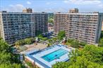 2 bedroom/2 bathroom with terrace in the Village Mall Hillcrest Condo. Fantastic location and great amenities that include a gym, pool BBQ area, assigned indoor parking and a children&rsquo;s playground. There is also a 24 hour doorman and a laundry room on each floor. All amenities are covered by the monthly common charges which are $816.83. There is also a $110.37 monthly capital charge. Great location near public transportation (Express bus to NYC and E and F trains), St. John&rsquo;s University, Queens College, airports, shopping and restaurants.