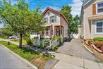 Located on a quiet street in Poughkeepsie, this 2-bedroom, 1-bathroom contemporary-style home offers 1, 190 square feet of potential and character. Set behind a quaint white picket fence, the front yard adds to the home&rsquo;s welcoming curb appeal, while mature trees provide shade and privacy.Inside, the home features original hardwood floors, large windows, and a bright, spacious kitchen with natural wood cabinetry and ample counter space heated floors. The flexible layout includes two generously sized bedrooms, a full bath, and multiple living areas that can be tailored to meet a variety of needs. Architectural touches like the octagon window, vaulted ceiling, and period trim add timeless character.The fenced front yard is ideal for gardening or creating a cozy sitting area, and the deep backyard offers a peaceful, green setting with space for outdoor gatherings or future enhancements.This property is well-suited for those seeking a manageable space with the opportunity to update and personalize. With solid bones and unique charm, itâ€™s ready for a new vision and some TLC. Whether youâ€™re a first-time buyer, investor, or someone looking to downsize, this home presents a smart opportunity in a convenient Poughkeepsie location close to shops, schools, and transit.