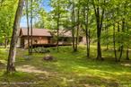 At 48 Deer Park, life unfolds in harmony with the land. Tucked at the end of a quiet cul-de-sac, this nearly six-acre retreat offers more than privacy - it offers presence. Here, mornings begin with the hush of wind through the trees and the soft ripple of Shingle Kill Creek just across the road. It&rsquo;s a place where nature isn&rsquo;t a backdrop, it&rsquo;s a daily companion. 48 Deer Park reflects the rhythm of Upstate living. The circular drive and grand stone chimney set a tone of welcome and warmth. Inside, the blend of hardwood, tile, and carpet creates a tactile experience - each room inviting you to slow down, settle in, and savor the moment. The kitchen here isn&rsquo;t just a place to cook - it&rsquo;s where stories are shared over simmering pots and laughter echoes off the walls. Whether you&rsquo;re preparing a quiet breakfast or hosting a lively dinner party, the space invites creativity and connection. And when the meal is done, the sunroom calls - a sanctuary for reflection, reading, or simply watching the seasons change. When its time for bed, the first-floor primary suite offers a retreat within a retreat - private, peaceful, and practical. Upstairs, two additional bedrooms and a full bath provide space for guests. A dedicated laundry room, half bath, and oversized two-car garage ensure that daily life remains effortless and organized. Outside, the property invites exploration. Winding trails lead you through quiet woods, past the gentle curve of the creek, and into moments of solitude or shared adventure. Whether you&rsquo;re casting a line for trout, walking your dog at sunrise, or simply breathing in the fresh mountain air, the land becomes part of your lifestyle. For those with vision, the two-story barn opens doors to possibility. Heated, with water and electric, it&rsquo;s ready to become a workshop, studio, or guest quarters (pending town approval). With space for five vehicles and its own driveway, it&rsquo;s as versatile as it is charming. Though surrounded by nature, the home is equipped for modern living. Underground electric, a generator, on-demand hot water, and high-speed internet ensure you&rsquo;re never disconnected -unless you choose to be. Beyond the property, Greene County offers a vibrant tapestry of experiences. Head to nearby golf courses that offer recreation, panoramic views of the Catskills, and a chance to unwind in nature&rsquo;s embrace. Spend weekends at local festivals like The Cairo Bears Auction, Cat&rsquo;n Around Catskill, or the Grey Fox Bluegrass Festival, where music, food, and community come alive. Stroll through farmers markets, play a ball game or two at Angelo Canna Town Park, or discover hidden gems in nearby towns like Cairo, Catskill, and Hudson. From farm-to-table dining to scenic hiking trails, the region pulses with creativity, warmth, and a deep appreciation for the land. It&rsquo;s a place where neighbors become friends, and every season brings new reasons to gather, explore, and celebrate. Just 2.5 hours from NYC and under 30 minutes to Windham and Hunter Mountains, 48 Deer Park offers the perfect balance of retreat and accessibility. Whether you&rsquo;re seeking a full-time residence or a weekend escape, this property invites you to live with intention, surrounded by beauty, possibility, and the quiet joy of Upstate life.