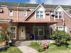This solid brick one family home offers a main level with an entrance foyer with coat closet, a spacious living room, formal dining room, and eat-in kitchen! The second level offers three large bedrooms and a full bathroom! Additional features include oak flooring under carpeting, a semi-finished basement, rear covered terrace, front patio, one car garage, driveway for an additional car & a rear fenced yard! Zoned for the newly expanded & highly regarded PS/IS 49, a Kindergarten to 8th Grade School! Located near local & express buses, subway, shops, Queens Center Mall, schools & the beautiful 55 Acre Juniper Valley Park!