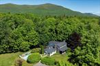 Step back in time with this enchanting antique farmhouse nestled on a sprawling 14-acre semi-rural retreat. This historical gem, built in the early 1800s, captures the rustic elegance of a bygone era while offering a tranquil sanctuary for nature lovers and history enthusiasts alike. Once the cherished residence of Jody Wolcott Carson (Johnny Carson&rsquo;s first wife) and Donald Bright Buckley, an original &rsquo;&rsquo;Mad Men&rsquo;&rsquo; era luminary, this home has been lovingly maintained since passing to the current owners in 1972. The estate boasts an iconic large red barn, adding to the picturesque charm of the property. Explore the natural grandeur of the land, from the serene pond with its thriving wildlife, including Wide Mouth Bass, turtles, and blue herons, to the diverse horticultural collection featuring Sweetgum, Dawn Redwood, Dolgo Crabapples, Copper Beech and many other specimen trees. Enjoy summer days in the unique cement pool, which is partially shaded by a majestic Weeping Hemlock. Inside, the home features two inviting fireplaces and a tavern room, creating the perfect ambiance for cozy evenings. The studio/music room dazzles with a cathedral ceiling, a spiral staircase, leading to a sleeping loft, and an oversized arched paned window, complemented by a chandelier from the Biltmore in Manhattan. The kitchen, adorned with a cast iron cook stove, and the screened-in north facing porch add to the home&rsquo;s period charm. With a semi-circle driveway and room for two cars in the barn, the property proximity to both Woodstock and Saugerties, this home offers both seclusion and convenience. Discover a peaceful lifestyle surrounded by natural beauty and history at this Saugerties treasure. Welcome to your own slice of the Hudson Valley, where the past is your present.