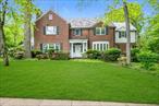 Welcome to 111 Clent Road, a One-of-a-Kind Center Hall Colonial in Prestigious Russell GardensSituated on a beautifully manicured corner lot in the highly sought-after neighborhood of Russell Gardens, this sun-drenched, stately Center Hall Colonial offers an exceptional blend of luxury, convenience, and versatility. Just a 6 to 8 minute walk to shopping, restaurants, and the LIRR, the location is unmatched for both comfort and connectivity.Inside, the home boasts 5 spacious bedrooms, 4 full bathrooms, and 2 half baths, providing ample space for family and guests. The layout includes a formal dining room, an expansive living room with fire place, and a sun-filled den with wall-to-wall windowsâ€”perfect for relaxation or entertaining. Enjoy casual meals in the charming breakfast room, or cook like a pro in the chefâ€™s kitchen, which features granite countertops, high-end appliances, a professional-grade extractor, a large pantry, and abundant storage. A maids&rsquo; quarters is conveniently located off the side entrance vestibule near the kitchen, ideal for live-in help or flexible use.The primary suite is a true retreat, complete with two walk-in closets, two additional closets, and a luxurious en-suite bath. The fully finished walk-out basement, (Man Cave) with second fire place offers direct access to the two-car garage, and includes a large family room, sitting room, XL laundry room, and boiler room. Great for entertaining, the .basement also offers a wet bar.What sets this home apart is the attached 1, 000 sq ft former Doctor&rsquo;s Office with own separate entrance and separate address. This bonus space offers 5 rooms, a half bath, and closets. It&rsquo;s a perfect space to convert into a suite for grandparents or in-laws . This rare feature offers an incredible opportunity for a any large families needing expansive interior space. Truly a one of kind opportunity. Additional highlights include:Original hardwood floors throughoutA full walk-up attic with generous storageA large, private backyard ideal for outdoor dining and entertainingNo street parking directly in front of the home, providing extra privacyThis extraordinary home offers a rare combination of elegance, function, and flexibilityâ€”all in a premier location.