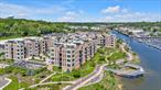 The Beacon at Garvies Point is a top option to live in a luxury condo building with amenities on the North Shore of Long Island. Similar to living in a luxury hotel resort, the 24 hour concierge and doorman provides security and sets the tone for all the amenities included. Beautiful lobby entrance, full gym, library, lounge, screening room, coffee bar all lead to the outdoor heated pool with food and beverage service. The complex is located in the 56 acre waterfront development that has a private beach at the end, marina and picturesque walkway esplanades with parks, bagel cafe and more. This expansive condominium, the largest one bedroom model in the building, Unit 1238 on a high fourth floor with it&rsquo;s own balcony, has a large primary bedroom suite with two outfitted closets plus separate office/den or possible second bedroom space. It is approximately 1, 198 sqft and in pristine condition, freshly painted. Afternoon light shines through this western exposure. The interior features an open-concept living and dining area with floor-to-ceiling windows, a gourmet chef&rsquo;s kitchen with oversized island, gas stove and designer finishes. Experience a life of ease and elegance on the North Shore of Long Island.