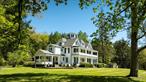 The Erpf EstateAn Enduring Legacy of Art, Architecture, and Untamed Wilderness390 Erpf Road, Arkville, NY  Offered at $10, 000, 000Set across 280 acres of pristine Catskill Mountain terrain, the Erpf Estate is a world unto itselfâ€”a sanctuary where nature, art, and architecture coalesce into a singular experience. More than a property, it is the embodiment of over a century of thoughtful stewardship, created and preserved by generations who understood the rare power of land imbued with soul, scale, and story.Just 2.25 hours from New York City, this unparalleled estate offers complete seclusion without remoteness. With over a mile of stream frontage, ten miles of private trails, meadows, forests, and panoramic ridgelines that rise to 2, 270 feet, the property offers a breathtaking immersion into wildernessâ€”balanced by infrastructure designed for refined living.At its core lies one of the most extraordinary sculptural landmarks in the world: the largest stone maze ever built, a 1, 680-foot-long environmental sculpture by British artist Michael Ayrton. Completed in 1965 and described by the artist as â€œthe only one of stone since the 4th or 5th century B.C., â€ the labyrinth features towering walls and original bronzes of Daedalus, Icarus, and the Minotaur. Across the estate, more than a dozen outdoor sculptures are seamlessly integrated into the landscape, echoing its deep artistic roots.The architectural centerpiece is a fully renovated 5, 300-square-foot colonial-style residence, renovated in 2016 for modern mountain living. With eight bedrooms, seven and a half baths, expansive decks and patios, and a meditative cupola, the home offers commanding views over formal gardens, wide lawns, and the surrounding forested hills. Moss-lined bluestone paths and a covered cedar staircase lead from a semi-circular pond to a beautifully restored 2, 800-square-foot brick guest house with three private apartments, perfect for guests, staff, or continued use as a creative retreat.The estate is remarkably well-equipped, with multiple outbuildings that enhance its function and potential:â€¢ An 800 sq ft pool house with two showers and kitchenetteâ€¢ A 56â€™ x 24â€™ heated pool with a 3, 500 sq ft bluestone terraceâ€¢ A 1, 440 sq ft 5 stall horse barn and polo stick and ball fieldâ€¢ Garages for up to six vehiclesâ€¢ A rustic office cabin and trout stream pump houseâ€¢ A Har-Tru tennis court ready for resurfacing for tennis or pickleballâ€¢ Wired and wireless high-speed internet and a full security and camera systemâ€¢ Central wood furnace and infrastructure ready for off-grid solar energyThe land itself is a living canvas of potential: 40 acres of lawns, meadows and pasture, 240 acres of mixed forest, and two year-round streamsâ€”Bush Kill and Dry Brookâ€”that offer private swimming holes, trout fishing, and serve as vital wildlife corridors. Bald eagles, deer, black bear, wild turkey, and trout are just a few of the species that thrive here.Unencumbered by conservation easements or deed restrictions, the estate offers extraordinary freedom to expand or evolve. Several ideal building sites exist, including one near the entry bridge overlooking the stream. Whether as a private retreat, multi-generational compound, boutique wellness resort, or artist-in-residence program, the canvas is wide open.The property is offered with over a dozen outdoor sculptures. A comprehensive inventory is available upon request.The Erpf Estate is not simply a placeâ€”it is a rare inheritance.A world built with vision, care, and imagination. A place to retreat, to reflect, to inspireâ€”and to begin a new chapter in a legacy over a century in the making.