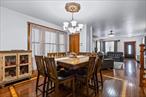 Welcome to an exceptional opportunity in the highly desirable Pelham Bay neighborhood! This stunning, fully renovated legal two-family home seamlessly blends modern elegance with practical design, offering spacious living, high-end finishes, and excellent income potential.Main Duplex Unit:*9ft ceilings on the main floor, creating an airy and inviting space*Three generously sized bedrooms, including a primary suite with soaring 14ft ceilings, skylights, and a dedicated dressing room*Two full bathrooms with contemporary upgrades*Sleek, modern kitchen with direct access to a new back deck, *Newly added spiral staircase leading to a beautifully designed backyard oasisSecond Unit - Walkout Studio:*Expansive open layout with full wet bar and keg tap*Stainless steel kitchen and dedicated laundry room*Direct access to backyard, parking, and private entry*Ideal for rental income or extended family living (Currently used as a single-family home)Luxury Upgrades & High-End Features:Step inside and enjoy top-tier enhancements, including:*Custom double-stacked hardwood floors*Premium MARVIN ($1600 each window x 25) windows flooding rooms with natural light*Three brand-new designer bathrooms*New roof, water heater, and central AC split system*Brand-new storm doors and energy-efficient featuresIncome Potential & Convenience:*Estimated rental income up to $6, 100/month ($4, 000 for the duplex unit, $2, 100 for the studio unit)*Private 3-car driveway (additional income opportunity)*Tranquil NEW backyard retreat featuring a new gazebo, and 6-ft privacy fence (furniture is available for sale too)*Super Low taxes for added financial advantageCentrally located within walking distance to public transportation, major highways, shopping, and the train, Pelham Bay Park, City Island, Orchard Beach, this home offers the perfect balance of urban convenience and suburban serenity.A Rare Findâ€”Donâ€™t Miss Out! Schedule your showing Today!