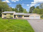 SPACIOUS RAISED RANCH WITH MODERN UPGRADES!!! Welcome to this beautifully maintained 3-bedroom, 2.5-bathroom Raised Ranch, ideally situated in the Town of Thompson and within the Monticello Central School District. Located just minutes from the Village of Monticello, you&rsquo;ll enjoy convenient access to local shops, dining, parks, and major highways including Route 17 and I-86â€”perfect for commuters and weekend travelers alike. This home offers a spacious 2, 472 sq ft layout designed for comfort and functionality. The main level features a bright and inviting living area, a formal dining room, and an eat-in kitchen equipped with stainless steel appliances, ample cabinetry, and generous counter space. Three well-appointed bedrooms provide ample space for rest and relaxation, including a primary suite with a private en-suite bathroom. The partially finished walk-out basement offers additional living space, perfect for a family room, home office, or gym, along with a convenient half-bathroom and laundry area. Outside, enjoy the 0.52-acre lot with a spacious backyard, ideal for outdoor activities and entertaining. Additional features include a two-car attached garage, oil hot water heating, and wall/window unit cooling for year-round comfort. Don&rsquo;t miss this opportunity to own a charming home in a prime locationâ€”schedule your private showing today!