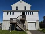 Waterfront Colonial Gem â€“ Rebuilt in 2021 & Dock-ReadyThis beautifully Colonial home offers stunning water views and direct waterfront access with the potential to build your own private boat dock. Featuring a full brand new fire sprinkler system, this home combines safety with serene coastal living.Conveniently located within walking distance to commercial area including Stop & Shop, Loweâ€™s, Applebeeâ€™s, Costco, and other major retailers, and with easy access to public transportation.The spacious basement features 9.5-foot ceilings and durable poured concrete construction. Its solid foundation is reinforced with deep-set, anti-rust alloy steel piles extending over 18 feetâ€”engineered for superior stability and protection against flooding or storm surges.Enjoy a brand-new, energy-efficient heating and hot water system, complete with a modern tankless gas water heater for endless hot water on demand.