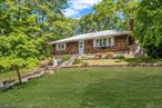 Back on the market after deal fell through! Don&rsquo;t miss this second chance!! At 29 Patchogue Rd in Sound Beach, youâ€™ll find that rare blend of affordability, privacy, and charm on Long Islandâ€™s scenic North Shore. Elevated nearly 200 feet above sea level, this lovingly maintained high ranch offers worry-free coastal living just a short walk from your private community beach. Step inside and feel the flowâ€”from the newly renovated kitchen to the open dining area and out to your covered outdoor living space, perfect for summer evenings and Sunday brunches. Outside, mature trees and a gentle breeze surround you in tranquil, natural beauty, while the finished basement and spacious attic give you all the room you need to grow. Whether you dream of a home office, playroom, or even an in-law suite, the potential here is real. And when winter comes? Curl up by the wood-burning stove and enjoy the warmth and savings. Practical. Peaceful. Ready to welcome you home.